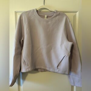 Lululemon size 10 women’s sweatshirt. Never been worn.